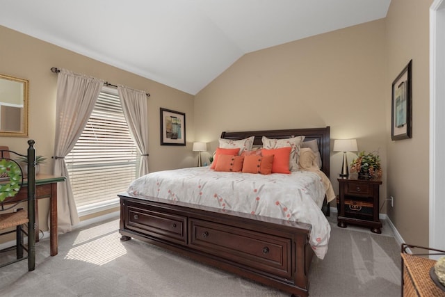 9614 Oconnor Ln, Missouri City, TX 77459 - bedroom featuring light colored carpet, baseboards, vaulted ceiling, and multiple windows