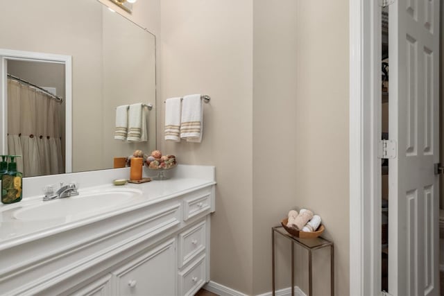9614 Oconnor Ln, Missouri City, TX 77459 - bathroom with baseboards and vanity
