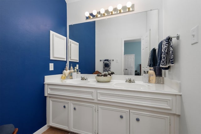 9614 Oconnor Ln, Missouri City, TX 77459 - full bathroom featuring a sink, baseboards, and double vanity