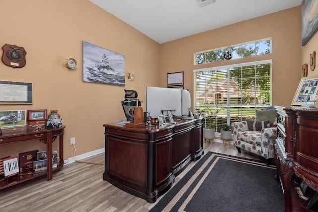 9614 Oconnor Ln, Missouri City, TX 77459 - office with light wood-type flooring, baseboards, and visible vents