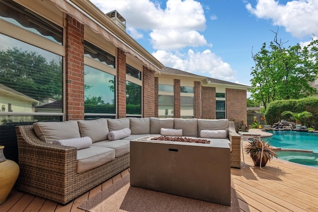 9614 Oconnor Ln, Missouri City, TX 77459 - wooden terrace featuring an outdoor living space with a fire pit and an outdoor pool