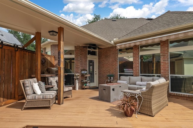 9614 Oconnor Ln, Missouri City, TX 77459 - deck with fence, an outdoor living space with a fire pit, a grill, and exterior kitchen