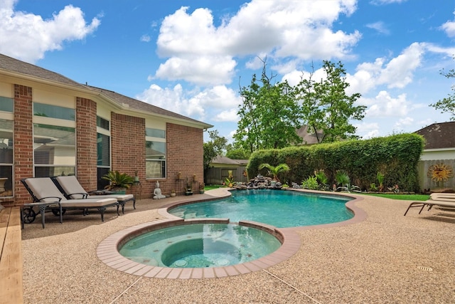 9614 Oconnor Ln, Missouri City, TX 77459 - view of pool with a fenced backyard, a patio area, and a pool with connected hot tub
