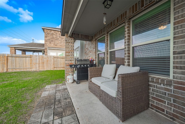 view of patio / terrace with fence and area for grilling