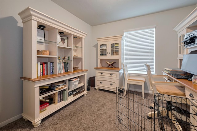 carpeted home office featuring baseboards