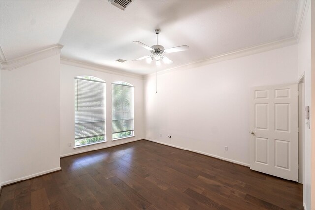 54 N Crossed Birch Pl, The Woodlands, TX 77381 - spare room featuring visible vents, ornamental molding, baseboards, a ceiling fan, and dark wood finished floors