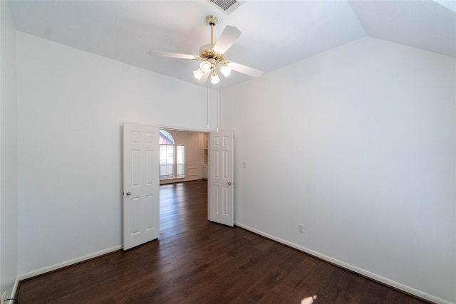 54 N Crossed Birch Pl, The Woodlands, TX 77381 - unfurnished room with dark wood finished floors, a ceiling fan, baseboards, vaulted ceiling, and visible vents