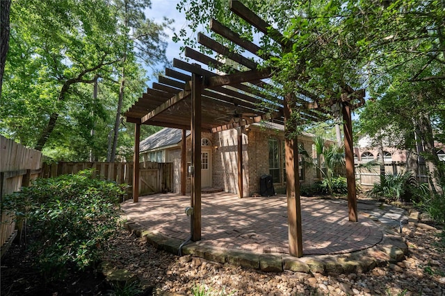 54 N Crossed Birch Pl, The Woodlands, TX 77381 - view of patio with a fenced backyard, a pergola, and ceiling fan