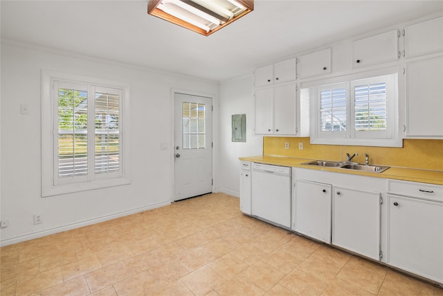 kitchen featuring dishwasher, a sink, light countertops, baseboards, and white cabinetry