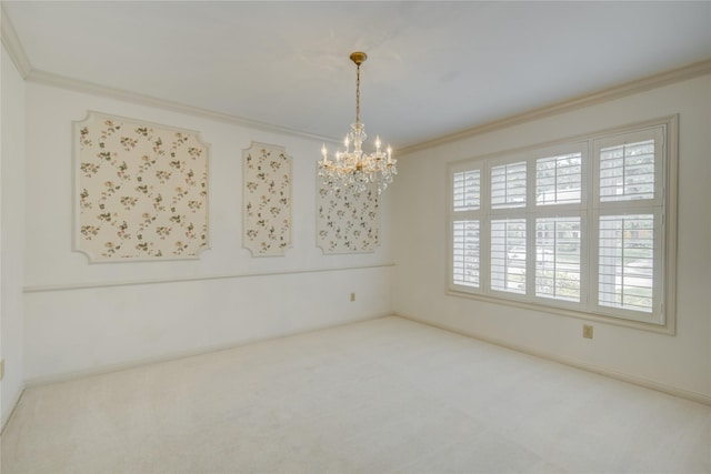 unfurnished room featuring a healthy amount of sunlight, ornamental molding, carpet, and a notable chandelier