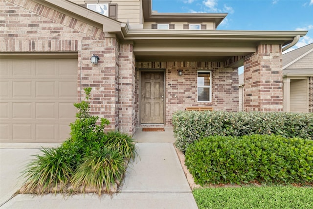 41534 Stampede Stream Dr, Magnolia, TX 77354 - entrance to property with brick siding, a garage, and a porch