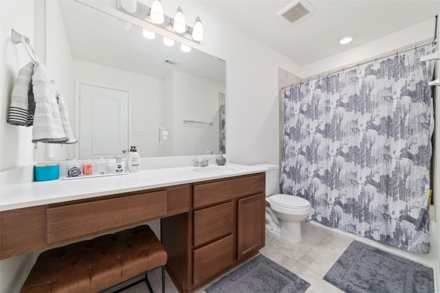 41534 Stampede Stream Dr, Magnolia, TX 77354 - bathroom featuring toilet, visible vents, tile patterned flooring, and vanity