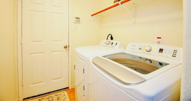 13216 Castlewind Ln, Pearland, TX 77584 - washroom with laundry area and washing machine and dryer