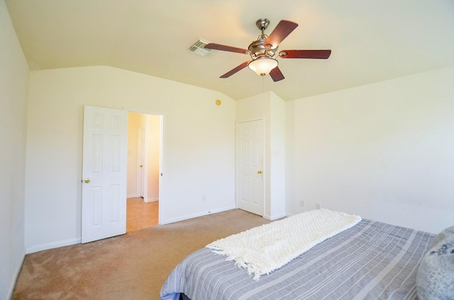 13216 Castlewind Ln, Pearland, TX 77584 - bedroom with vaulted ceiling, visible vents, baseboards, and carpet