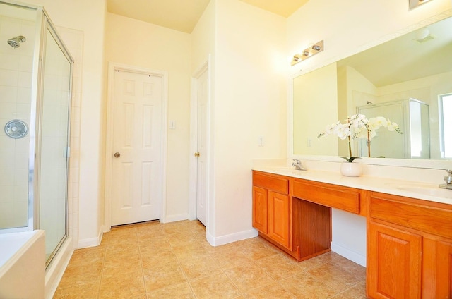 13216 Castlewind Ln, Pearland, TX 77584 - full bathroom with a sink, tile patterned flooring, a shower stall, and double vanity