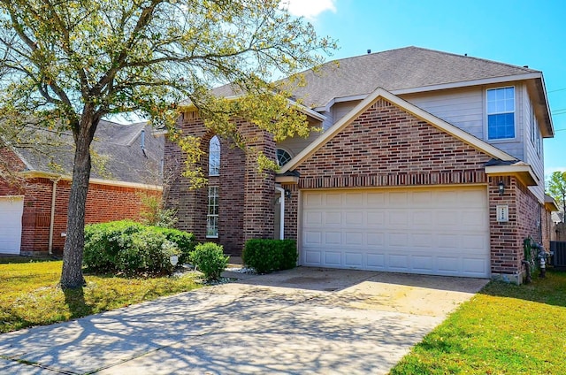 13216 Castlewind Ln, Pearland, TX 77584 - traditional-style house with roof with shingles, brick siding, cooling unit, concrete driveway, and an attached garage