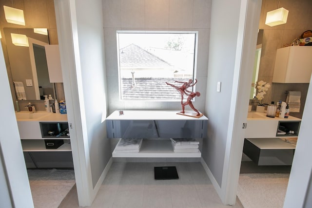 interior space featuring baseboards