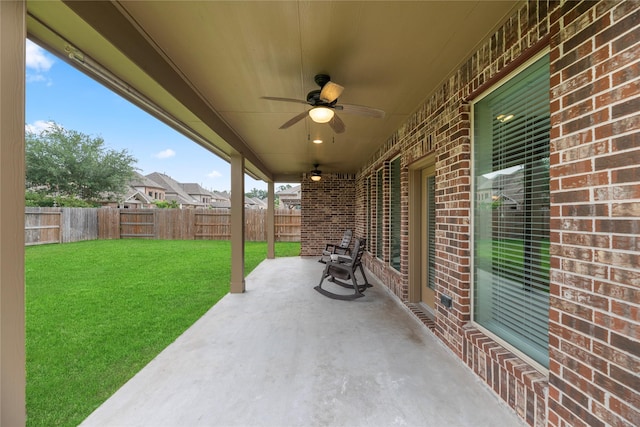 view of patio / terrace with ceiling fan and a fenced backyard
