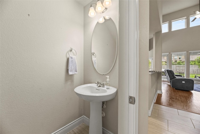 bathroom with baseboards