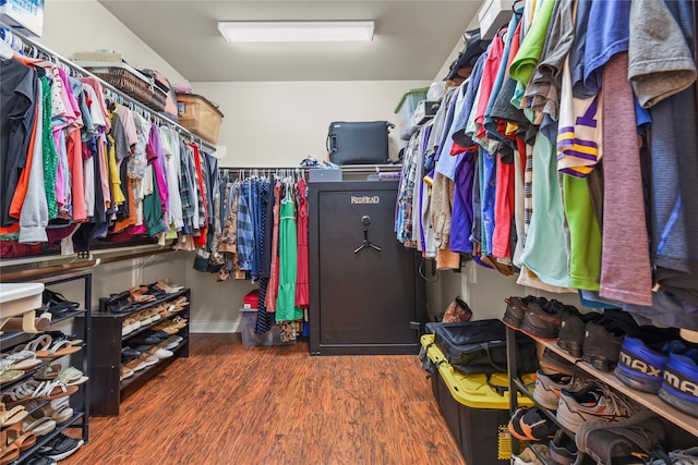 spacious closet with wood finished floors