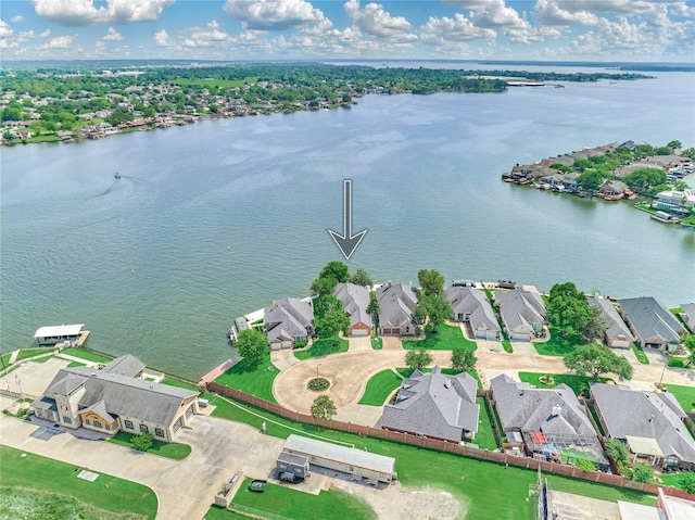 13625 Lakeside Place Dr, Willis, TX 77318 - drone / aerial view featuring a water view and a residential view