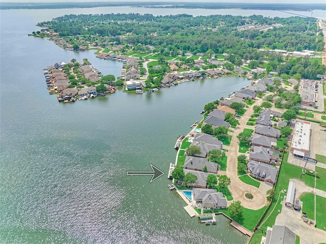 13625 Lakeside Place Dr, Willis, TX 77318 - birds eye view of property with a water view and a residential view