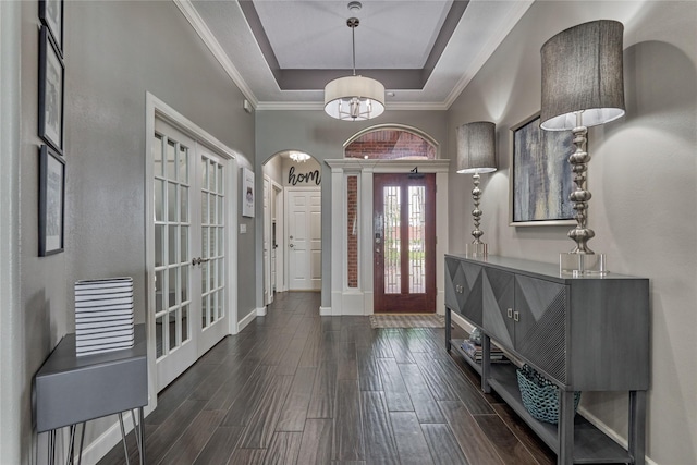 13625 Lakeside Place Dr, Willis, TX 77318 - entrance foyer featuring baseboards, french doors, a raised ceiling, and dark wood-style floors