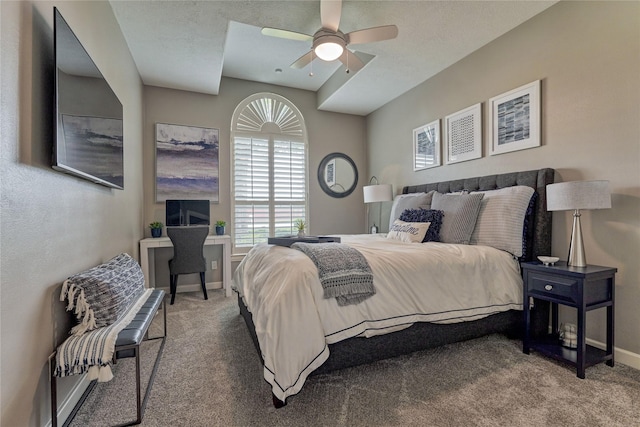 13625 Lakeside Place Dr, Willis, TX 77318 - carpeted bedroom with baseboards and ceiling fan