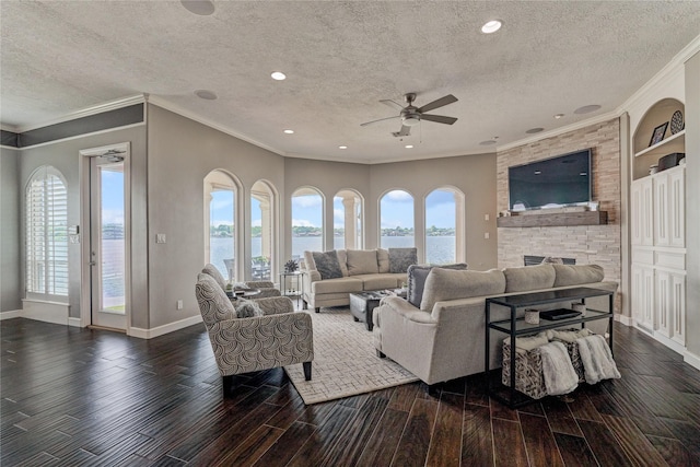 13625 Lakeside Place Dr, Willis, TX 77318 - living room with plenty of natural light, wood finished floors, and ceiling fan