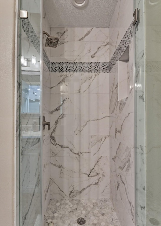 13625 Lakeside Place Dr, Willis, TX 77318 - full bath with a marble finish shower