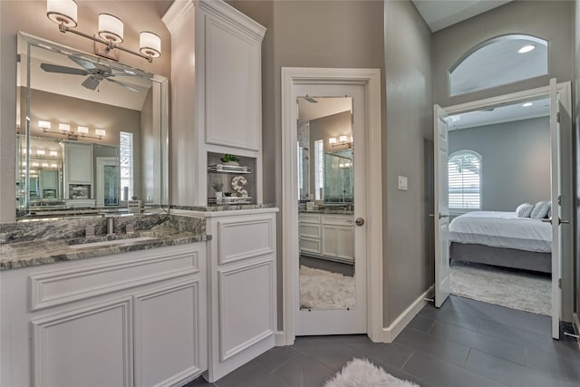 13625 Lakeside Place Dr, Willis, TX 77318 - bathroom featuring ensuite bath, tile patterned floors, vanity, and ceiling fan