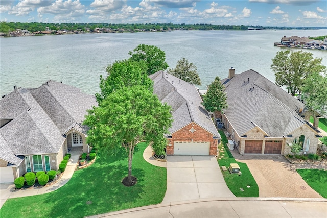 13625 Lakeside Place Dr, Willis, TX 77318 - drone / aerial view featuring a water view