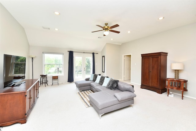 living area with ceiling fan, vaulted ceiling, baseboards, light carpet, and recessed lighting