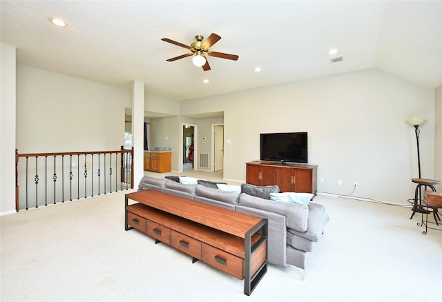 carpeted living area with a ceiling fan, recessed lighting, and visible vents