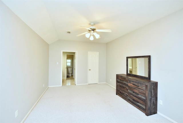 unfurnished bedroom featuring baseboards, ceiling fan, and light colored carpet