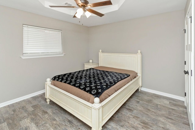 3300 Michelle Ave, Vidor, TX 77662 - bedroom featuring a ceiling fan, baseboards, and wood finished floors
