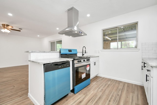 kitchen featuring stainless steel gas range, light wood-type flooring, island exhaust hood, a sink, and dishwasher
