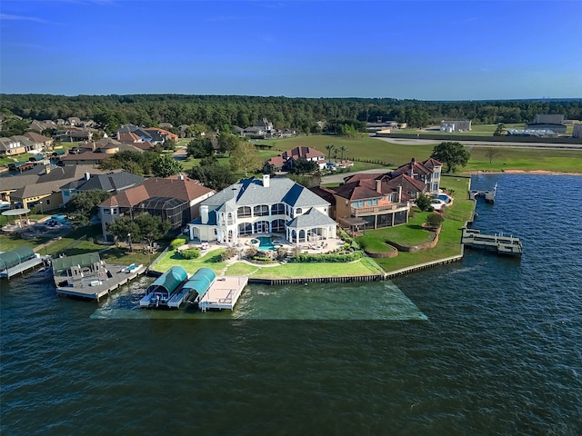 birds eye view of property featuring a water view