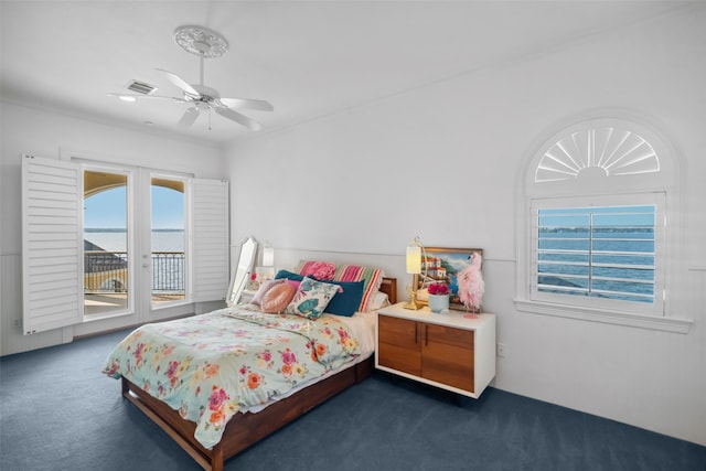 bedroom with multiple windows, carpet, visible vents, and access to exterior
