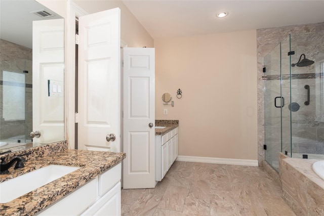 bathroom featuring visible vents, a shower stall, two vanities, a sink, and marble finish floor