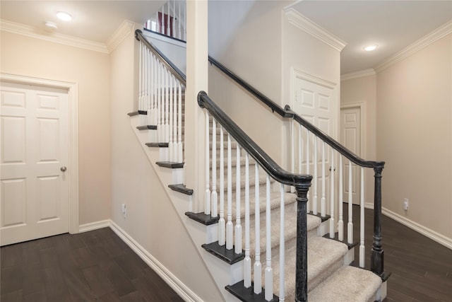 staircase featuring crown molding, baseboards, recessed lighting, and wood finished floors