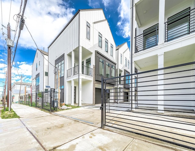 1707 Milby St, Houston, TX 77003 - exterior space featuring board and batten siding and concrete driveway
