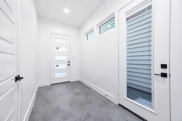1707 Milby St, Houston, TX 77003 - doorway featuring baseboards and recessed lighting