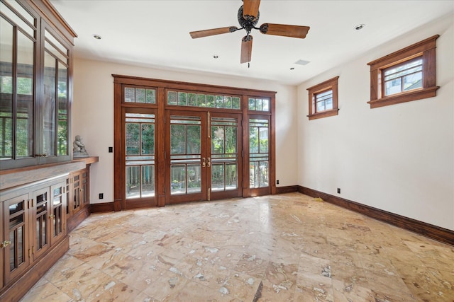 2614 Stanford St, Houston, TX 77006 - doorway featuring baseboards, a ceiling fan, and recessed lighting