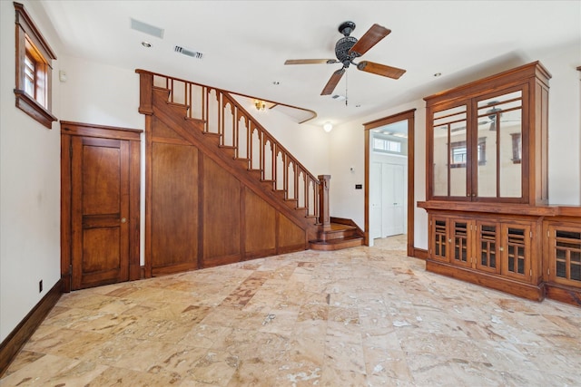 2614 Stanford St, Houston, TX 77006 - entryway featuring baseboards, stairs, and ceiling fan