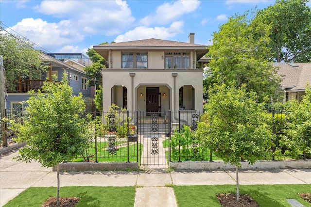 2614 Stanford St, Houston, TX 77006 - view of front of home featuring stucco siding, a gate, a porch, and a chimney
