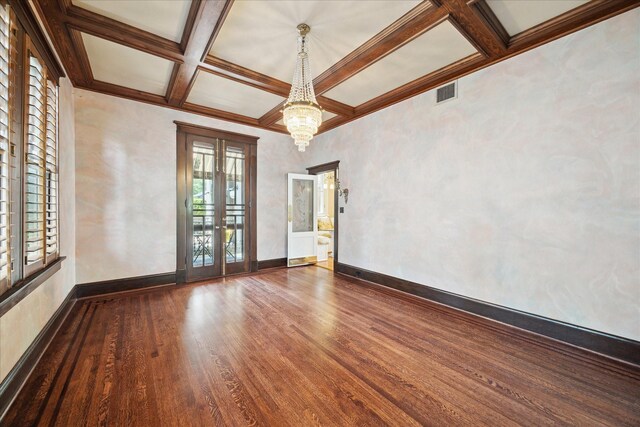 2614 Stanford St, Houston, TX 77006 - unfurnished room with french doors, a chandelier, coffered ceiling, dark wood finished floors, and beamed ceiling