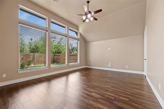 15306 Guava Vis, Conroe, TX 77302 - additional living space with a ceiling fan, dark wood finished floors, lofted ceiling, and baseboards