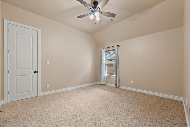 15306 Guava Vis, Conroe, TX 77302 - unfurnished room featuring ceiling fan, light carpet, baseboards, and lofted ceiling
