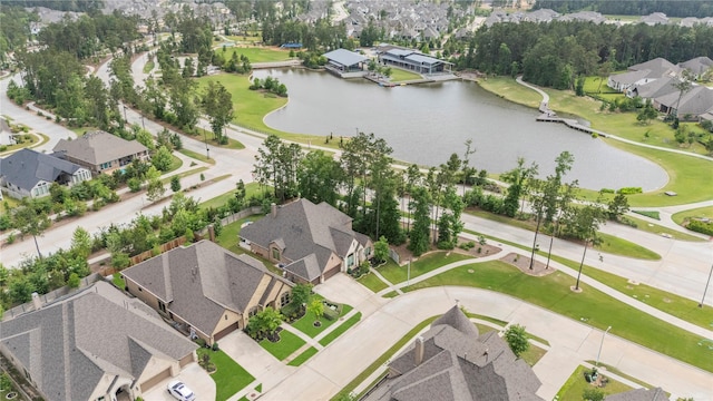 15306 Guava Vis, Conroe, TX 77302 - aerial perspective of suburban area featuring a nearby body of water